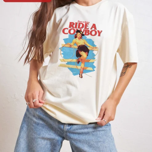 Close-up of Save a Horse Ride a Cowboy Tee Retro Pinup Cowgirl Graphic Shirt for Women for streetwear fans in Chicago, Illinois