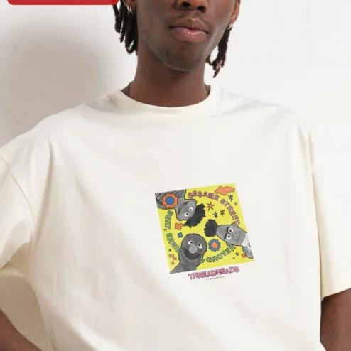 Customer in Chicago, Illinois wearing Sesame Street Bert Ernie Grover Retro Graphic Tee for Women and Men