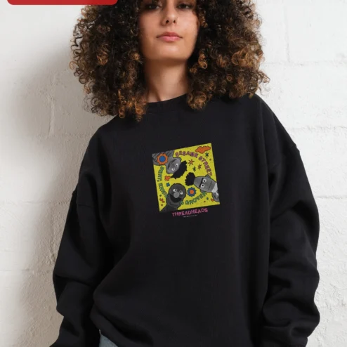 Customer in Chicago, Illinois wearing Sesame Street Bert Ernie Grover Sweatshirt Retro Pop Culture Crewneck Gift for Fans