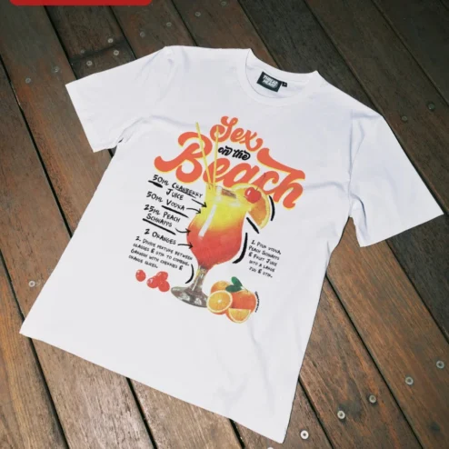 Sex on the Beach Cocktail Retro Graphic Tee Summer Vacation Party Shirt on a hanger, ready to ship from Chicago, Illinois