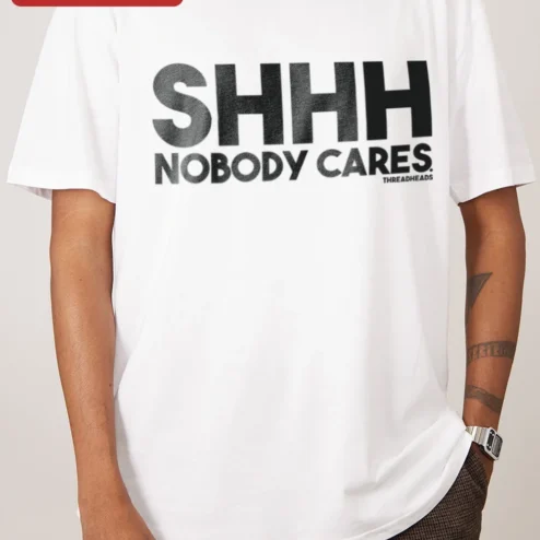 SHHH NOBODY CARES Funny Sarcastic Graphic Tee for Women Men Gen Z Streetwear Cotton Shirt on a hanger, ready to ship from Chicago, Illinois