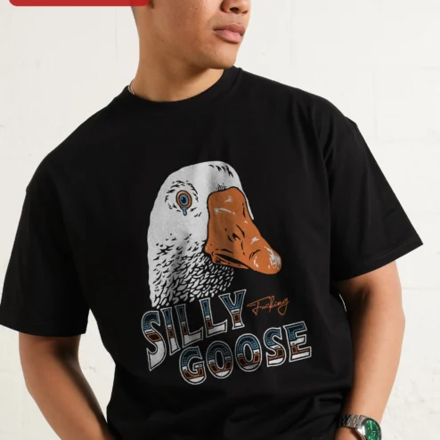 Silly Fucking Goose Tee Funny Vintage Distressed Crying Bird Graphic Shirt on a hanger, ready to ship from Chicago, Illinois
