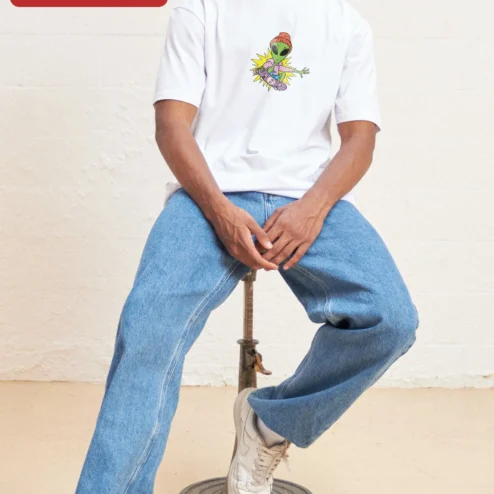 Customer in Chicago, Illinois wearing Skateboarding Alien Graphic Tee Retro Sci-Fi Streetwear Shirt for Teens