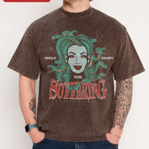 SMILE THE SUFFERING ENJOY Medusa Graphic Tee Dark Humor Acid Wash Shirt on a hanger, ready to ship from Chicago, Illinois