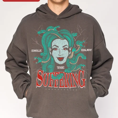 SMILE THE SUFFERING ENJOY Medusa Hoodie Dark Humor Gothic Mythology Apparel on a hanger, ready to ship from Chicago, Illinois