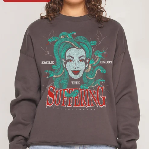 SMILE THE SUFFERING ENJOY Medusa Sweatshirt Dark Humor Greek Mythology Apparel on a hanger, ready to ship from Chicago, Illinois
