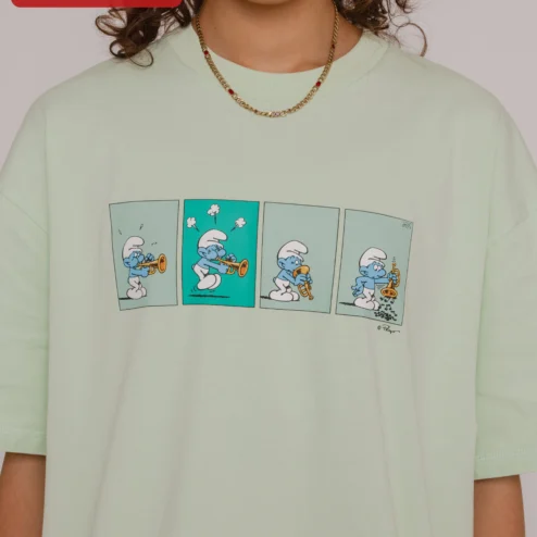 Smurf Tee Trumpet Comic Strip Vintage Cartoon Graphic T-Shirt for Adults on a hanger, ready to ship from Chicago, Illinois