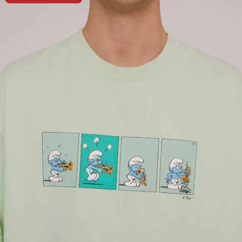 Customer in Chicago, Illinois wearing Smurf Tee Trumpet Comic Strip Vintage Cartoon Graphic T-Shirt for Adults