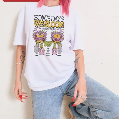 Customer in Chicago, Illinois wearing Some Days We Bloom Some Days We Gloom Mental Health Affirmation Ringer Tee
