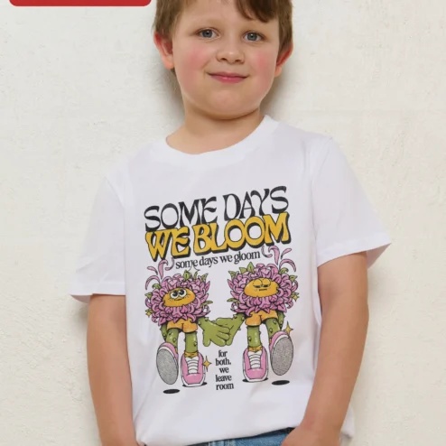 Customer in Chicago, Illinois wearing Some Days We Bloom Some Days We Gloom Mental Health Awareness Kids Tee