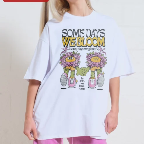 Customer in Chicago, Illinois wearing Some Days We Bloom Some Days We Gloom Mental Health Awareness Oversized Tee Retro Cartoon Flower Gra