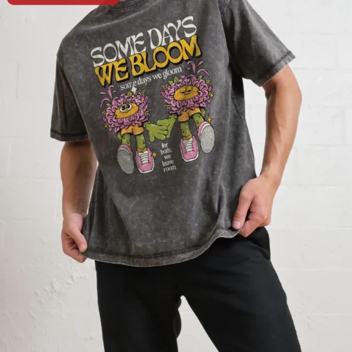 Some Days We Bloom Some Days We Gloom Mental Health Awareness Tee on a hanger, ready to ship from Chicago, Illinois