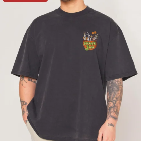 Space Jam Tee Looney Tunes Bugs Bunny Lola Daffy Duck Vintage Acid Wash Basketball Graphic Shirt on a hanger, ready to ship from Chicago, Illinois