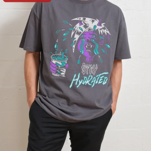 Stay Hydrated Vampire Graphic Tee Funny Horror Alt Streetwear Shirt on a hanger, ready to ship from Chicago, Illinois