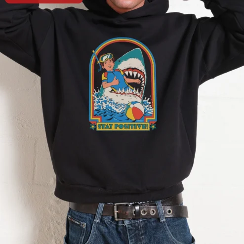Close-up of Stay Positive Hoodie Retro Scuba Diver Shark Graphic Pullover Funny Ocean Humor Gift for streetwear fans in Chicago, Illinois
