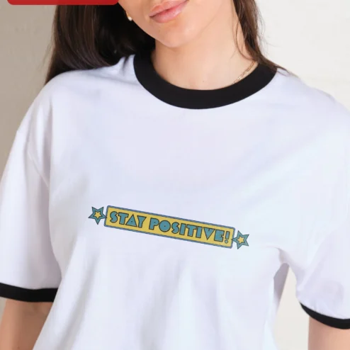 Close-up of Stay Positive! Retro Pop Art Graphic Tee Motivational Quote Shirt for Women Men for streetwear fans in Chicago, Illinois
