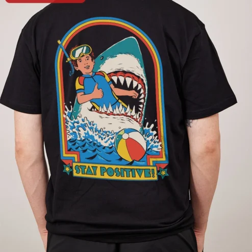 Close-up of Stay Positive! Retro Pop Art Graphic Tee Motivational Quote Shirt for Women Men for streetwear fans in Chicago, Illinois