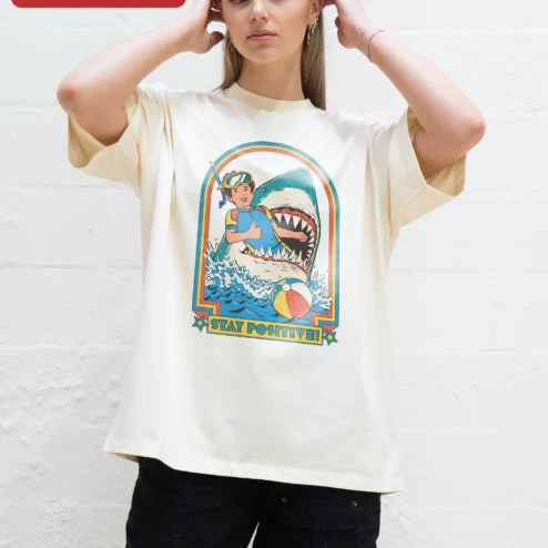 Close-up of Stay Positive Scuba Diver Shark Retro Graphic Tee Unisex Oversized Cotton Shirt for streetwear fans in Chicago, Illinois