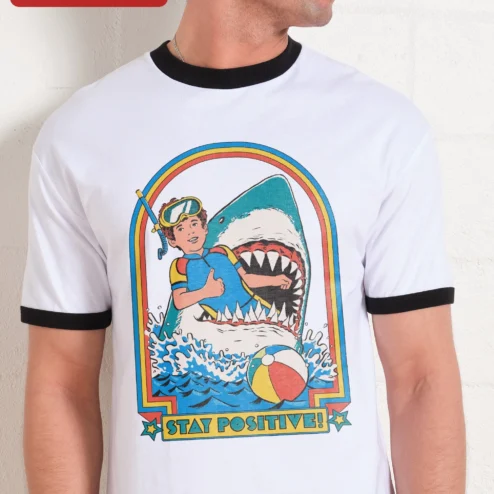 Close-up of Stay Positive Tee Retro Scuba Diver Shark Graphic T-Shirt Funny Motivational Shirt for Men Women for streetwear fans in Chicago, Illinois
