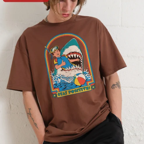 Close-up of Stay Positive Tee Retro Scuba Diver Shark Graphic T-Shirt Funny Motivational Shirt for Men Women for streetwear fans in Chicago, Illinois