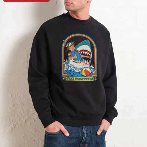 Close-up of Stay Positive! Vintage Shark Snorkeling Crewneck Sweatshirt Retro Beach Humor Gift for streetwear fans in Chicago, Illinois