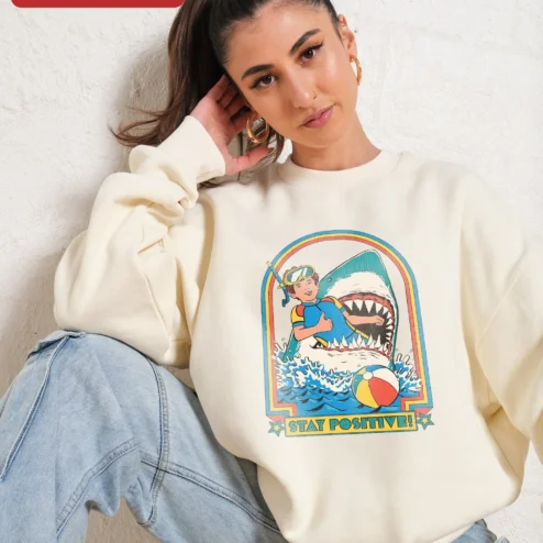 Close-up of Stay Positive! Vintage Shark Snorkeling Crewneck Sweatshirt Retro Beach Humor Gift for streetwear fans in Chicago, Illinois