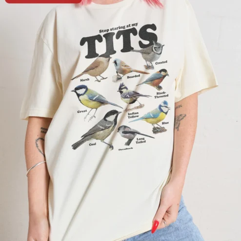 Close-up of Stop Staring At My Tits Vintage Bird Chart Graphic Tee Funny Ornithology Gift for streetwear fans in Chicago, Illinois