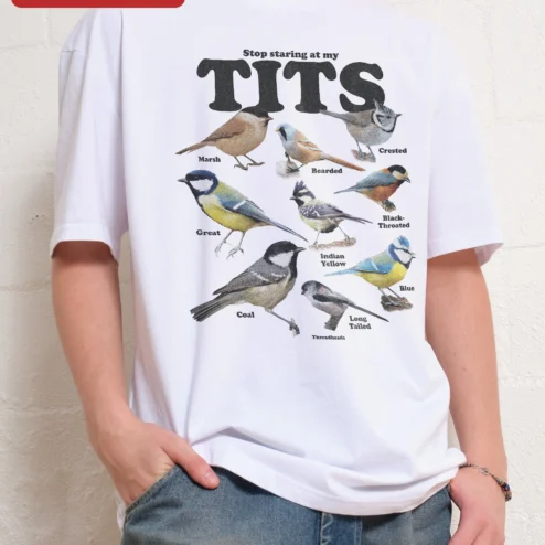 Close-up of Stop Staring At My Tits Vintage Bird Chart Graphic Tee Funny Ornithology Gift for streetwear fans in Chicago, Illinois