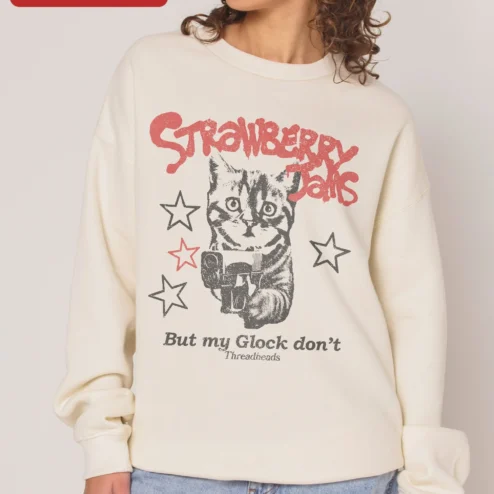 Customer in Chicago, Illinois wearing Strawberry Jams But My Glock Don't Sweatshirt Funny Cat Gun Graphic Crewneck