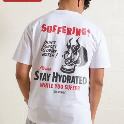 Close-up of Suffering? Flaming Skull Graphic Tee Dark Humor Punk Rock Streetwear Shirt for streetwear fans in Chicago, Illinois