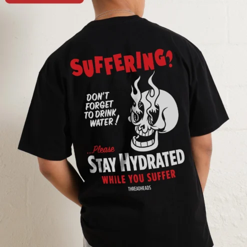 Customer in Chicago, Illinois wearing Suffering Flaming Skull Graphic Tee Oversized Streetwear Shirt for Men Women