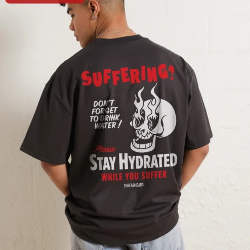 Close-up of Suffering Flaming Skull Graphic Tee Oversized Streetwear Shirt for Men Women for streetwear fans in Chicago, Illinois