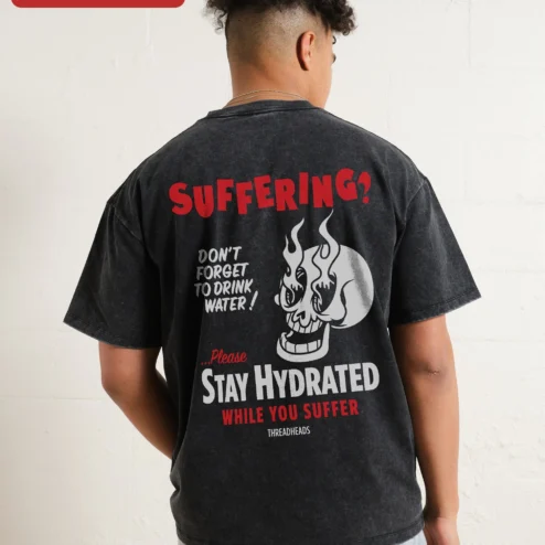Customer in Chicago, Illinois wearing SUFFERING? Funny Skull Graphic Tee Streetwear Acid Wash Shirt