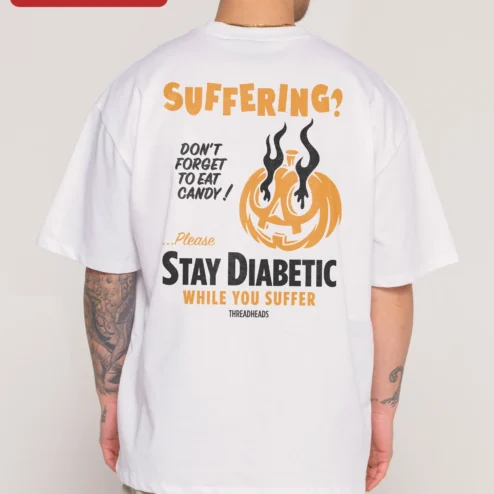 Customer in Chicago, Illinois wearing Suffering Pumpkin Halloween Graphic Tee Funny Dark Humor Oversized Shirt