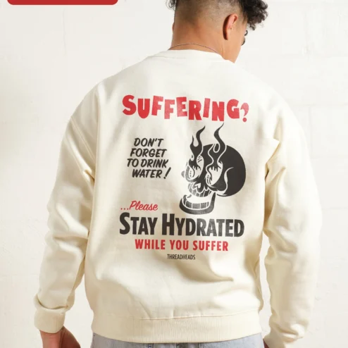 Close-up of SUFFERING? Skull Flame Sweatshirt Dark Humor Punk Rock Crewneck Gift for Men Women for streetwear fans in Chicago, Illinois