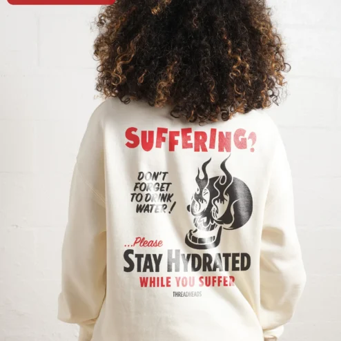 Customer in Chicago, Illinois wearing SUFFERING? Skull Flame Sweatshirt Dark Humor Punk Rock Crewneck Gift for Men Women