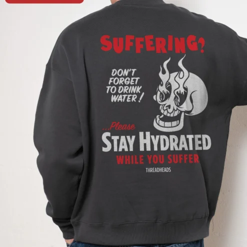 Customer in Chicago, Illinois wearing SUFFERING? Skull Flame Sweatshirt Dark Humor Punk Rock Crewneck Gift for Men Women