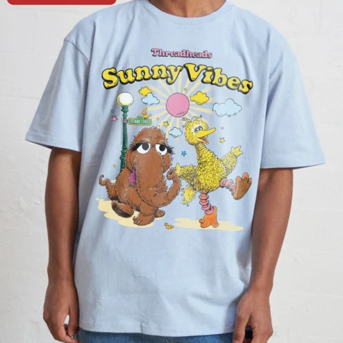 Customer in Chicago, Illinois wearing Sunny Vibes Big Bird Snuffleupagus Sesame Street Graphic Tee