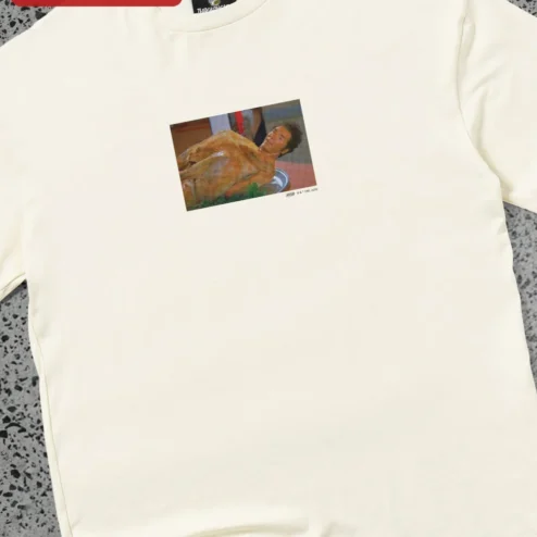 Customer in Chicago, Illinois wearing Surreal Meme Art Tee Absurd Streetwear Oversized Graphic Shirt for Men Women