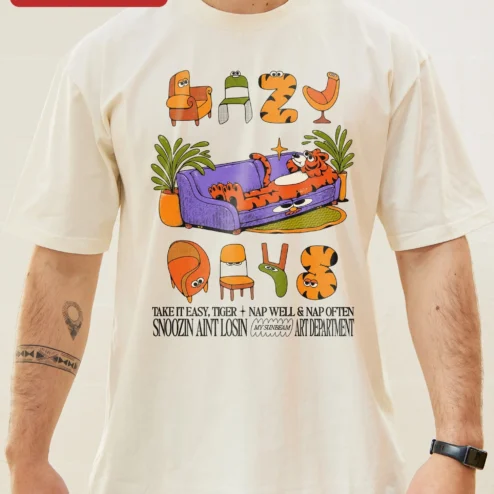 Take It Easy Tiger Tee Snoozin Aint Losin Nap Well Graphic Shirt on a hanger, ready to ship from Chicago, Illinois
