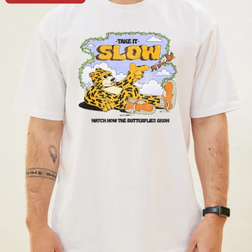 Take It Slow Watch How The Butterflies Grow Leopard Graphic Tee on a hanger, ready to ship from Chicago, Illinois