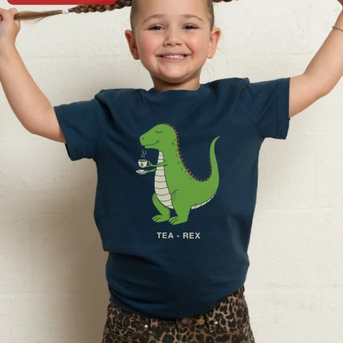 TEA REX Dinosaur Kids Tee Funny Tea Rex Cartoon Graphic T-Shirt for Children on a hanger, ready to ship from Chicago, Illinois