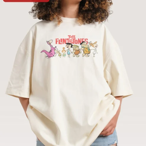 Close-up of The Flintstones Tee Vintage Cartoon Cast Fred Wilma Barney Betty Dino Retro Pop Culture Gift for streetwear fans in Chicago, Illinois