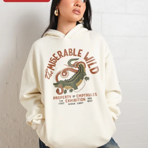 Close-up of The Miserable Wild Property of CMPTRULES Exhibition Hoodie Vintage Croc Graphic Pullover for streetwear fans in Chicago, Illinois
