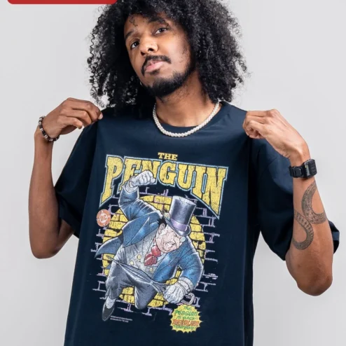 The Penguin Is Back Deadlier Than Ever Vintage Comic Tee DC Batman Villain Shirt on a hanger, ready to ship from Chicago, Illinois