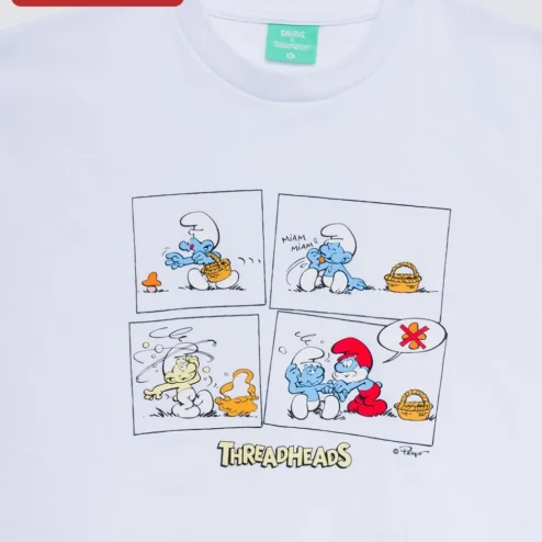Customer in Chicago, Illinois wearing The Smurfs Tee Oversized Vintage Cartoon Graphic T-Shirt Retro Pop Culture Apparel