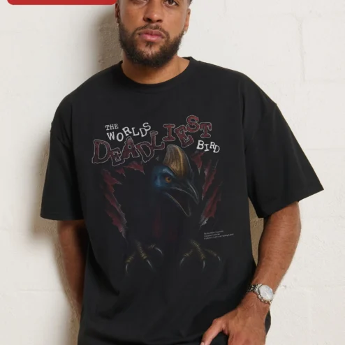 The World's Deadliest Bird Cassowary Graphic Tee for Nature Lovers on a hanger, ready to ship from Chicago, Illinois