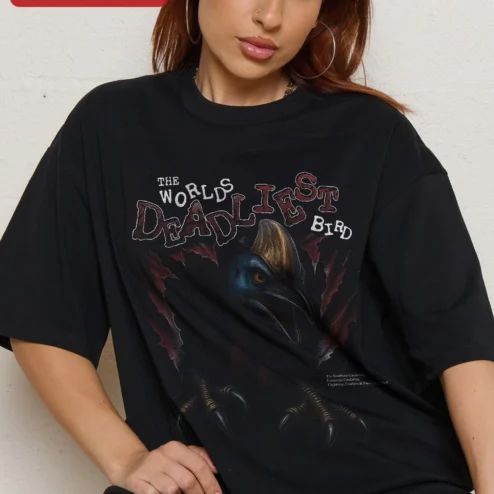 The World's Deadliest Bird Cassowary Graphic Tee Funny Nature Humor Shirt Gift for Bird Lovers on a hanger, ready to ship from Chicago, Illinois