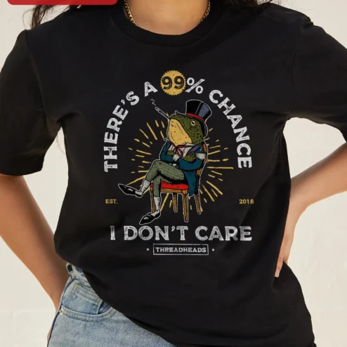 There's A 99% Chance I Don't Care Sarcastic Frog Graphic Tee Retro Cartoon Humor Shirt for Introvert on a hanger, ready to ship from Chicago, Illinois