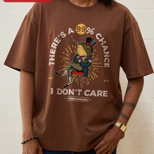 Customer in Chicago, Illinois wearing There's A 99% Chance I Don't Care Sarcastic Frog Graphic Tee Retro Cartoon Humor Shirt for Introvert